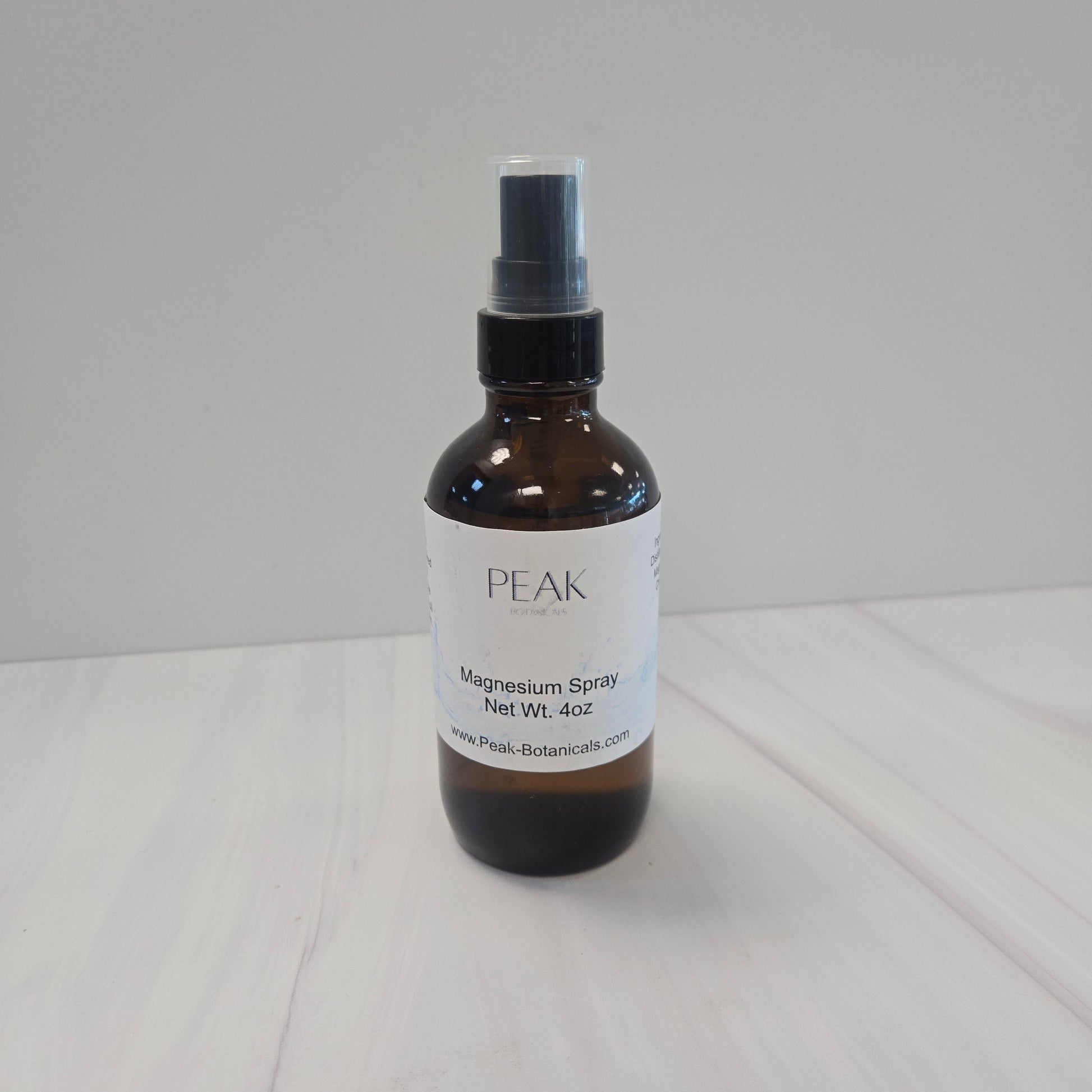 4oz Magnesium spray in glass amber spray bottle